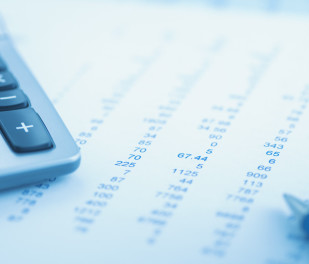 Close up of calculator and data